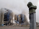 Monument of Taras Shevchenko near houses bombed by Russian troops in Borodyanka, Kyiv region